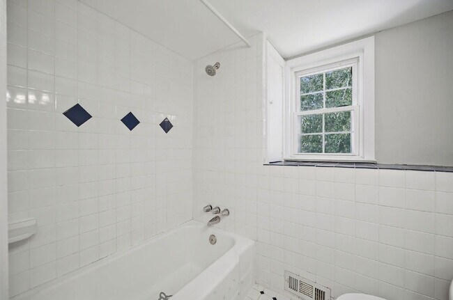 Building Photo - RARE FIND-4 BEDROOMS, 2 BATHROOMS, FENCED BACK YARD and GARAGE-PETS!!