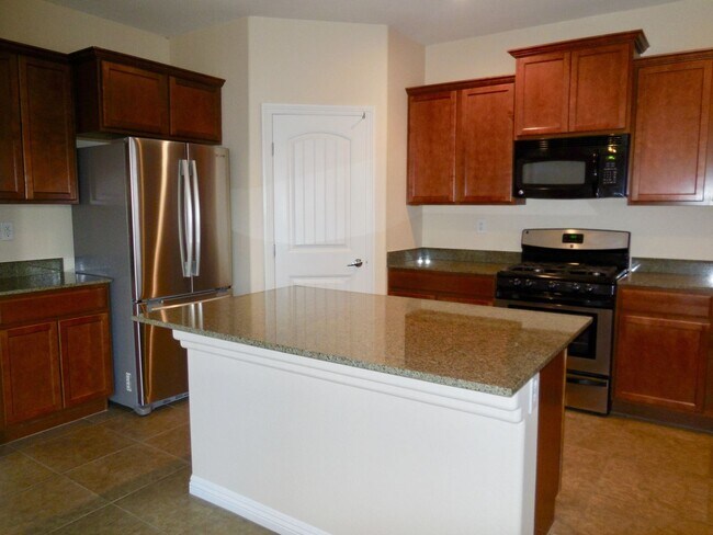 Building Photo - Spacious House w/Tons of Storage,Tile & Wo...