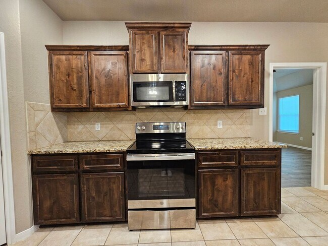 Building Photo - RENT REDUCTION - AVAILABLE NOW!