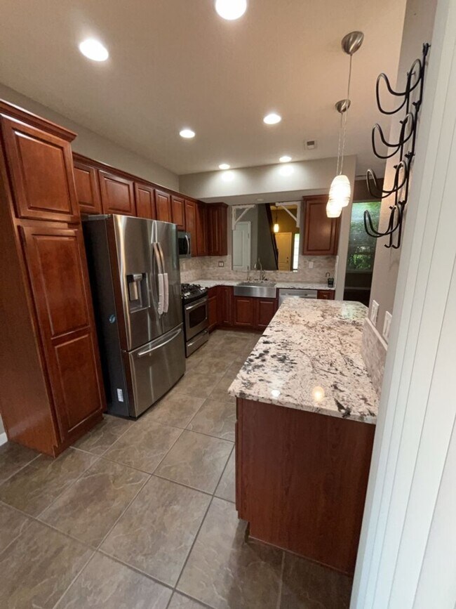Building Photo - 10115 Avenida Vista Cerros NW