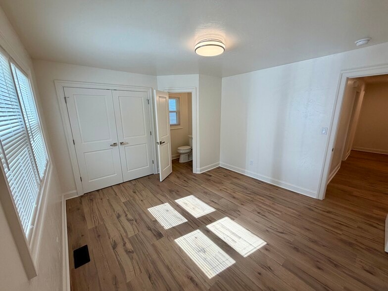 Bedroom with small powder room attached. - 329 Ronald Dr