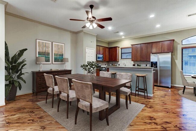 Building Photo - Impeccably Maintained Midtown Townhome wit...