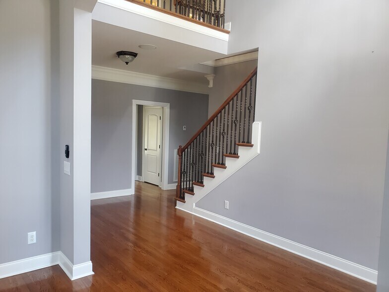 Bottom of Staircase - 1005 Brittain Downs Dr