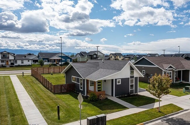 Building Photo - Charming Three Bedroom Home with Large Fenced Yard