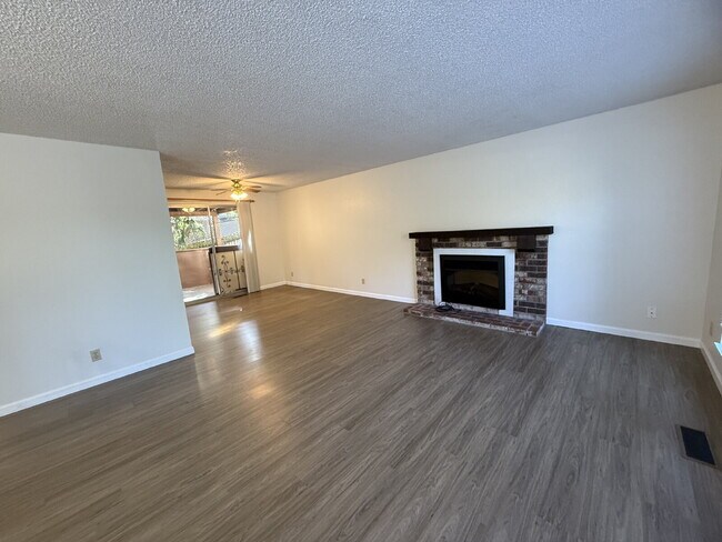 Building Photo - "Charming 3-Bedroom Home with Cozy Firepla...