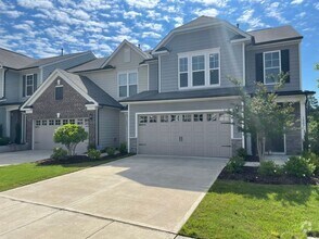 Building Photo - Like new 3 Bedroom townhouse with 2 car ga...