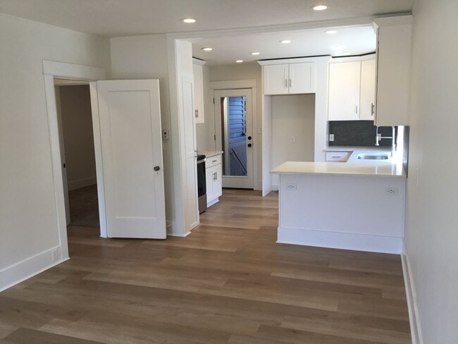 Building Photo - GOURMET KITCHEN/OPEN FLOOR PLAN