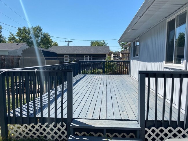 Building Photo - Spacious 4-Bedroom Home with Garage and Backyard in Milan!