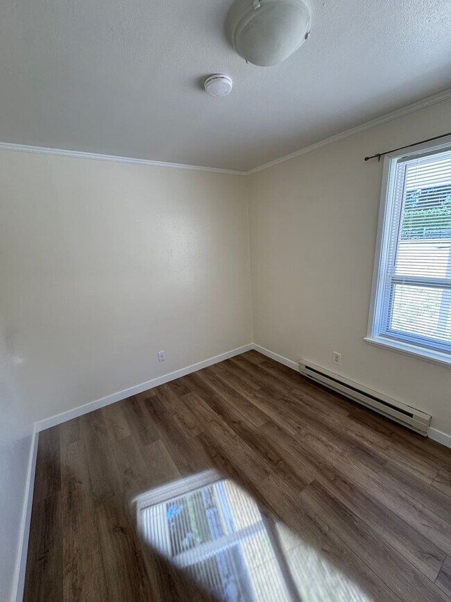 Building Photo - Charming Updated 2 Bedroom Home with Huge Backyard, A/C & Owner-Paid Landscaping
