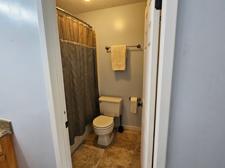 Bathroom off of bedroom 2 - 3615 N Wolf Creek Dr