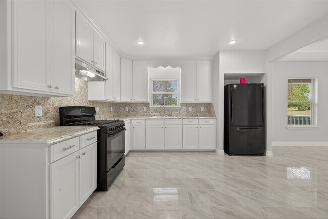 Building Photo - 6928 Apache St