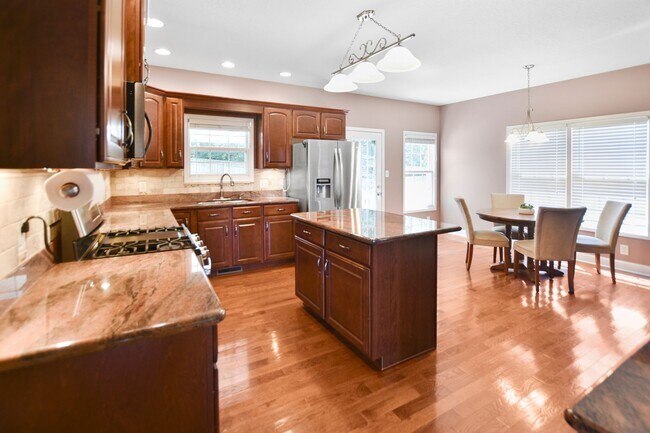 Building Photo - Pet Friendly Four Bedroom with Bonus!