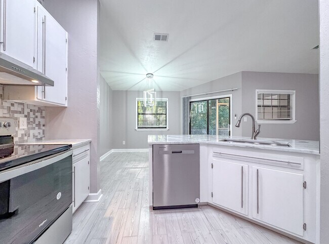 Building Photo - MODERN & Redone 1/1 w/ Tile Floors Throughout, Stainless Appliances, Granite Counters, Washer/Dry...