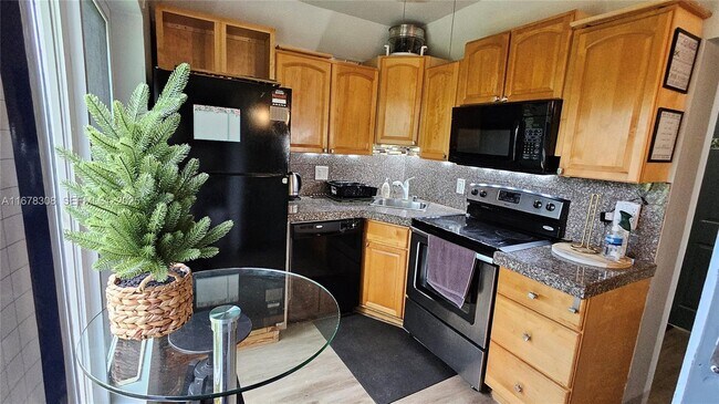 Building Photo - 3600 S Le Jeune Rd