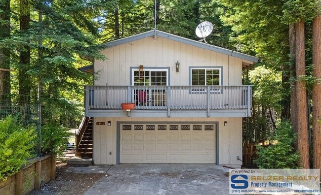 Primary Photo - Cozy & charming 4 bd. home amongst the trees!