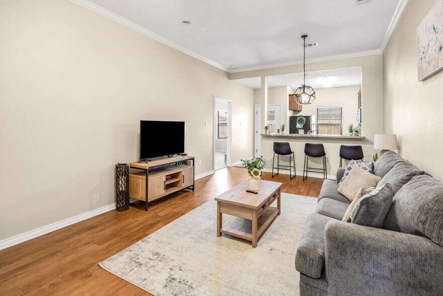 Building Photo - AUGUST PRE-LEASE Spacious 3 Bedroom 2.5 Bathroom Townhome with Covered Parking