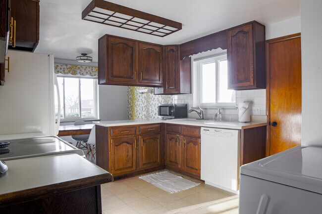 Building Photo - 6185 W 61st Ave