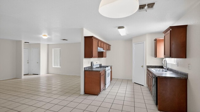 Building Photo - 7395 W San Miguel Ave