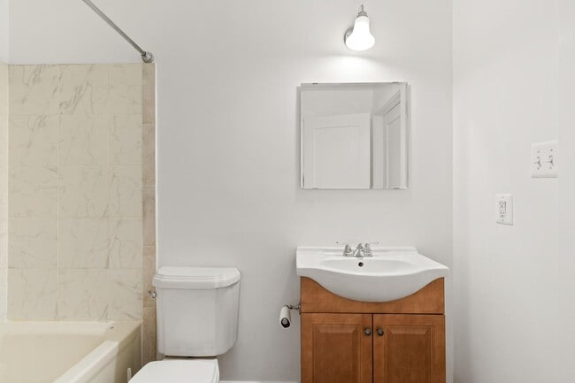 Building Photo - Charming One-Bedroom Basement Apartment