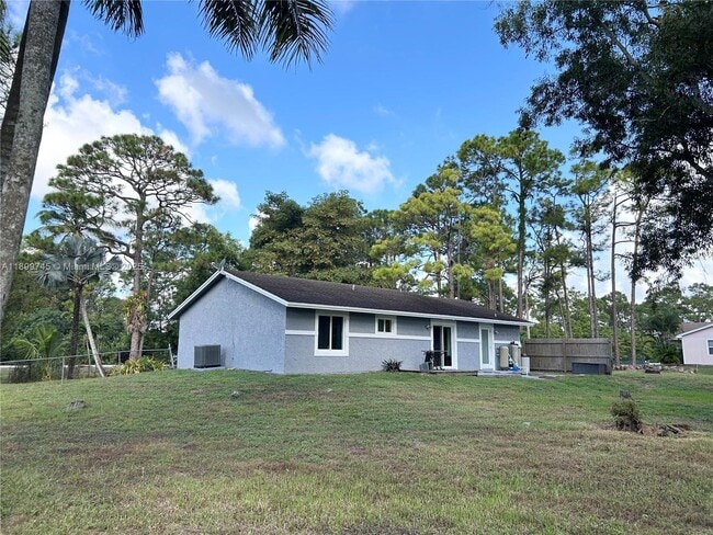 Building Photo - 6452 Royal Palm Beach Blvd