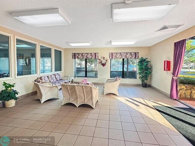 Building Photo - 6090 N Sabal Palm Blvd