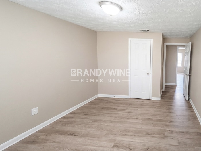 Building Photo - 8409 Red Holly Ln