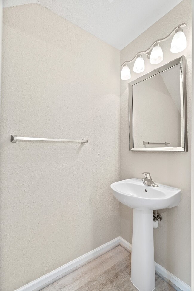 Building Photo - **NEWLY REMODELED ** MAINTENANCE FREE TOWN...