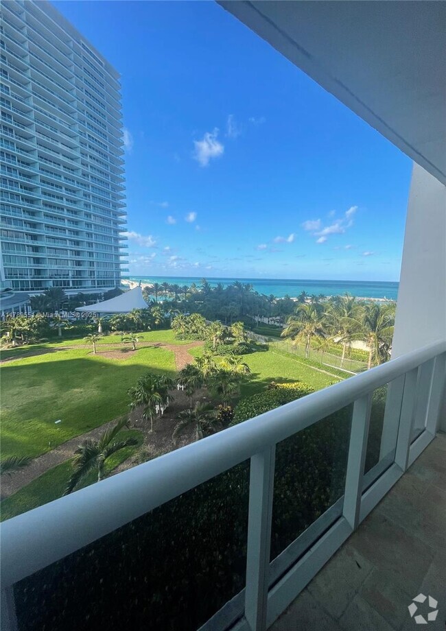 Building Photo - 10275 Collins Ave