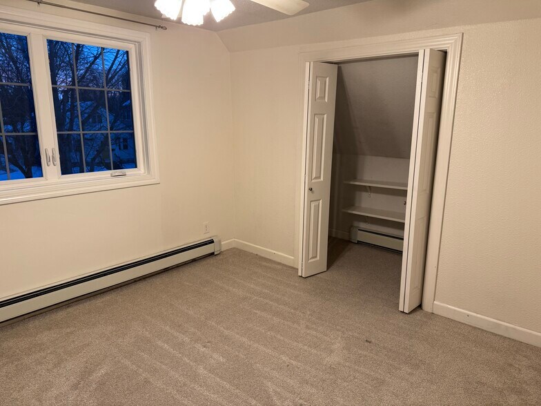 Main bedroom closet with built in shelves - 1369 Saint Clair Ave