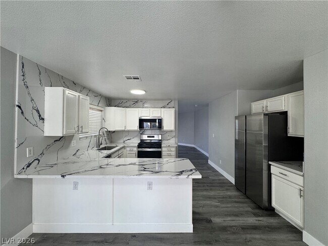 Building Photo - 10171 Arlington Abby St