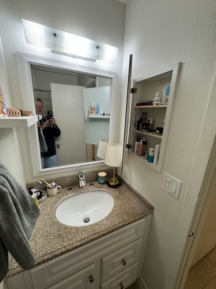 This photo shows additional medicine cabinet storage - 33966 Malaga Dr