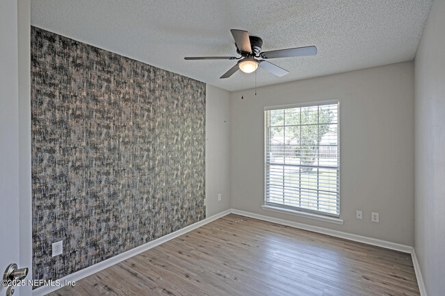 Building Photo - 7728 Pikes Peak Dr