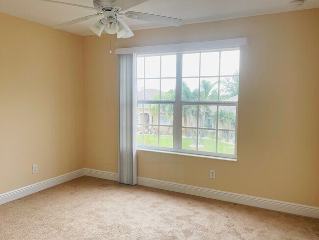 Building Photo - **SUNCOAST LAKES GATED COMMUNITY**
