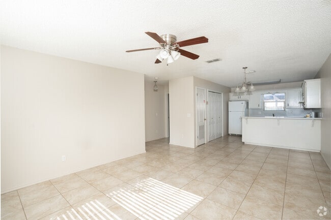2BR, 1BA - 848SF - Living Area - Paseo Del Sol Apartments