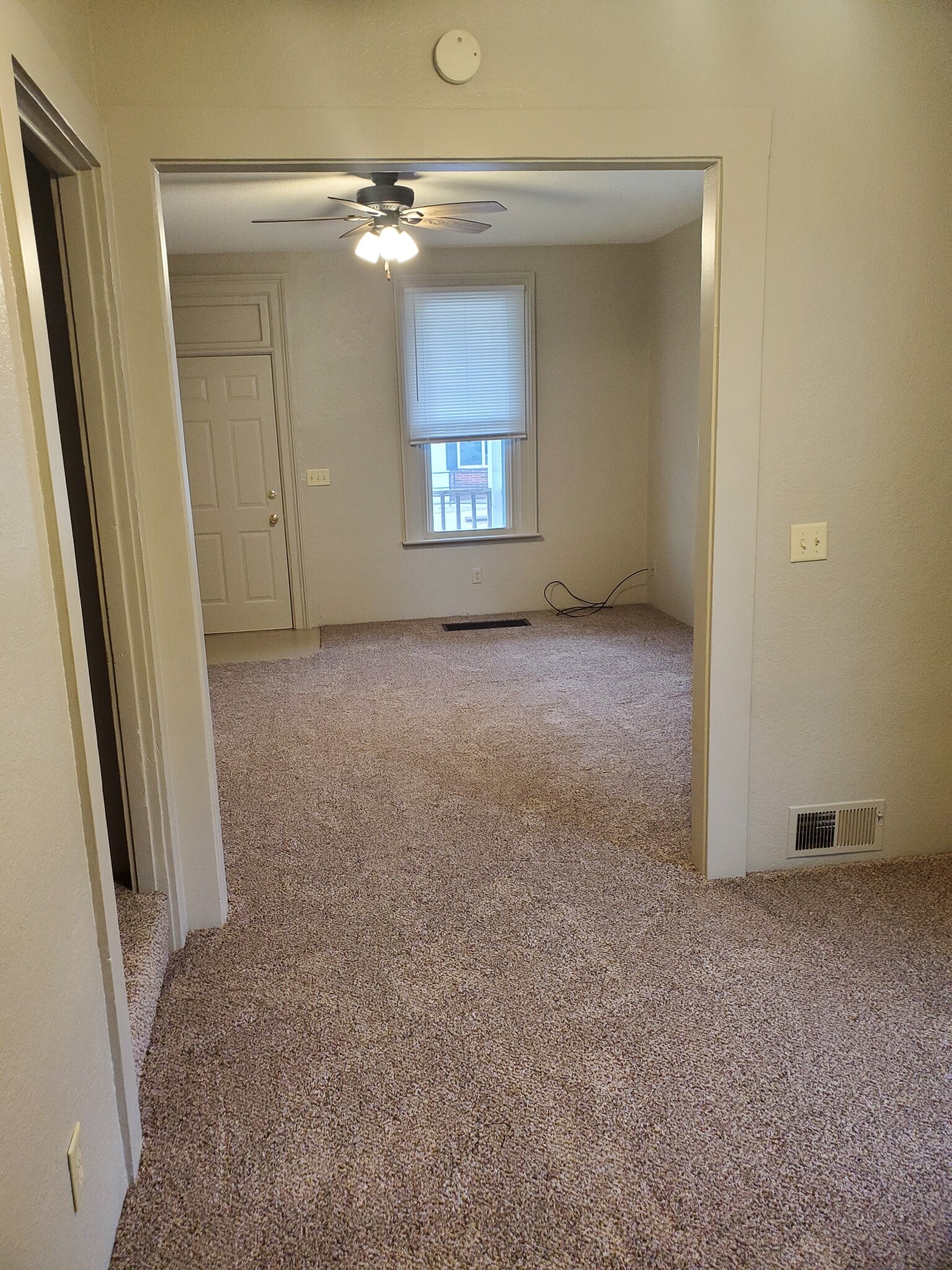 Living area (new carpet) - 522 E 22nd St