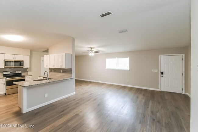 Building Photo - 7263 Eudine Dr N