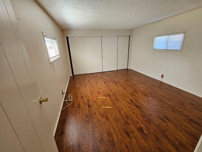 West Wing Primary Bedroom - 3851 Oakdale St