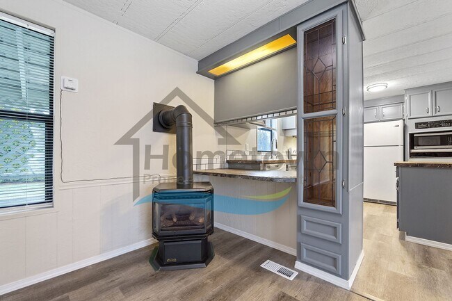 Building Photo - 2-Bedroom 2-Bathroom Home with Off-Street Parking Available in Coeur d’Alene!