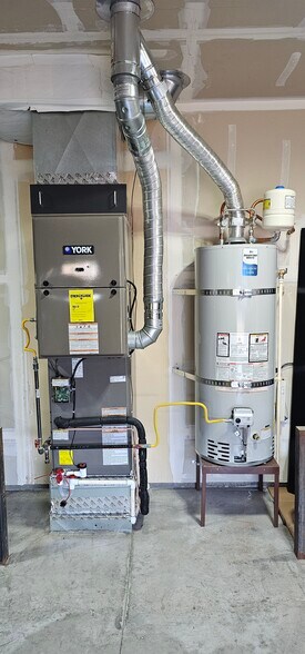 new hvac water heater - 9610 NE 102nd St