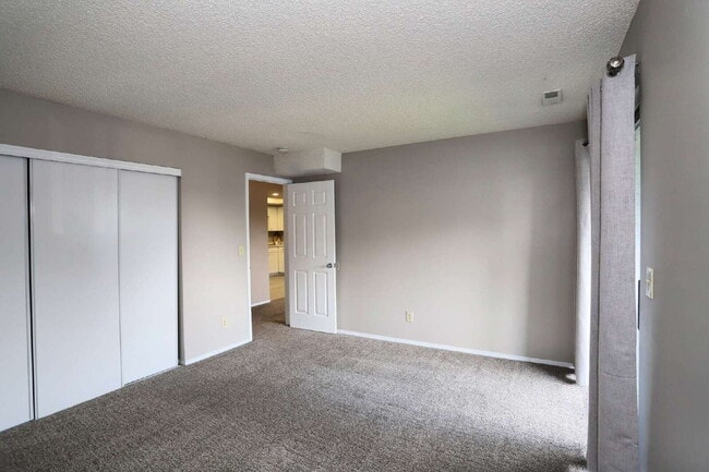 Building Photo - Modern Comfort Meets Style in This Sunlit,...
