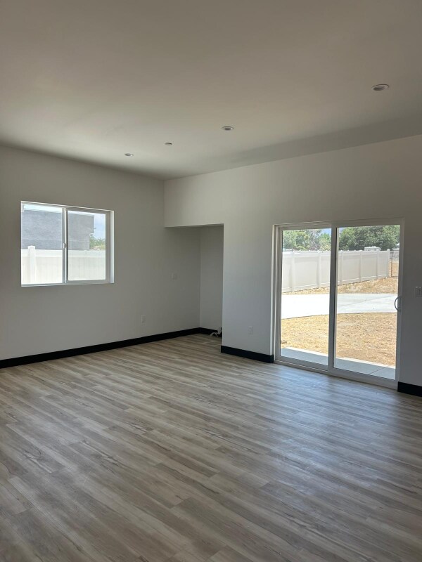 Building Photo - 9208 E Ave T 6