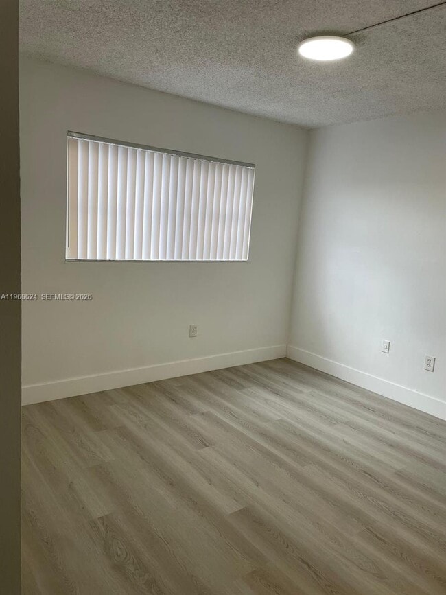 Building Photo - 1075 W 68th St