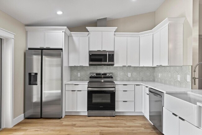 Building Photo - Modern Living Awaits!