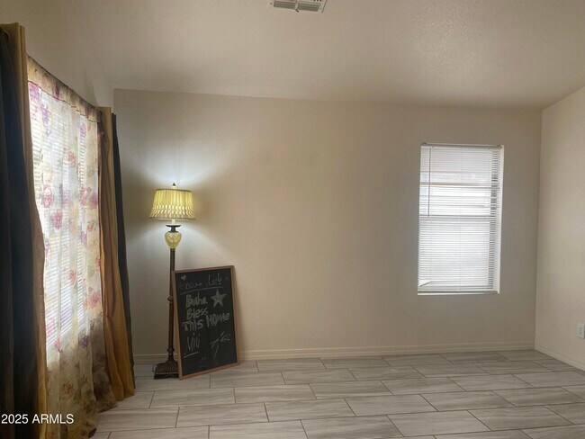 Building Photo - 8563 W Mission Ln