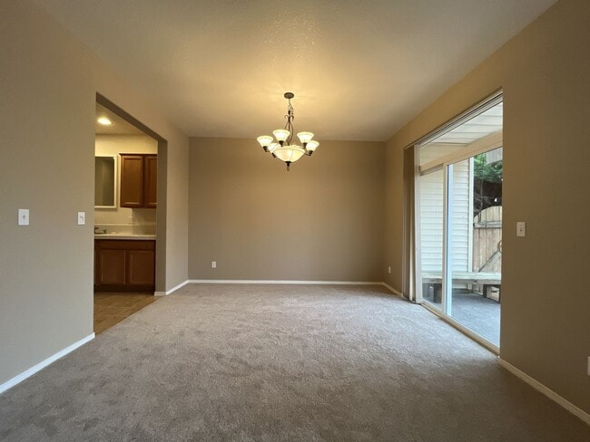 Building Photo - Inviting Two-Story 3BR Home Featuring Gas Range, Walk-In Closet, and Built-In Deck Seating