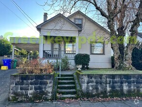 Building Photo - Huge, fenced back yard! Garage! Nice bonus...