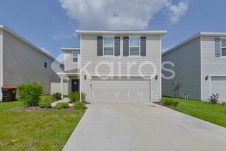 Building Photo - 8597 SW 44th Ct