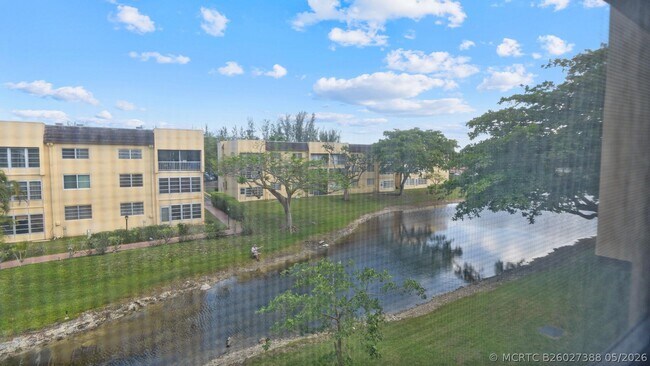 Building Photo - 5890 NW 64th Ave