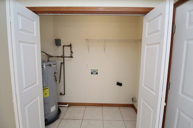 Building Photo - Coastal Living in Gulf Breeze! Spacious 2B...