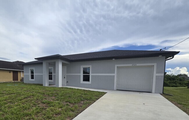 Building Photo - BRAND NEW CONSTRUCTION-3/2/1-MOVE IN READY